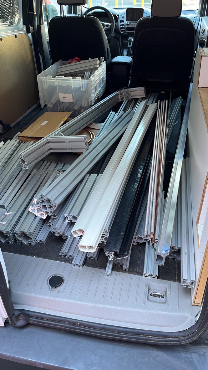 Aluminum extrusion profiles loaded through the rear of a van