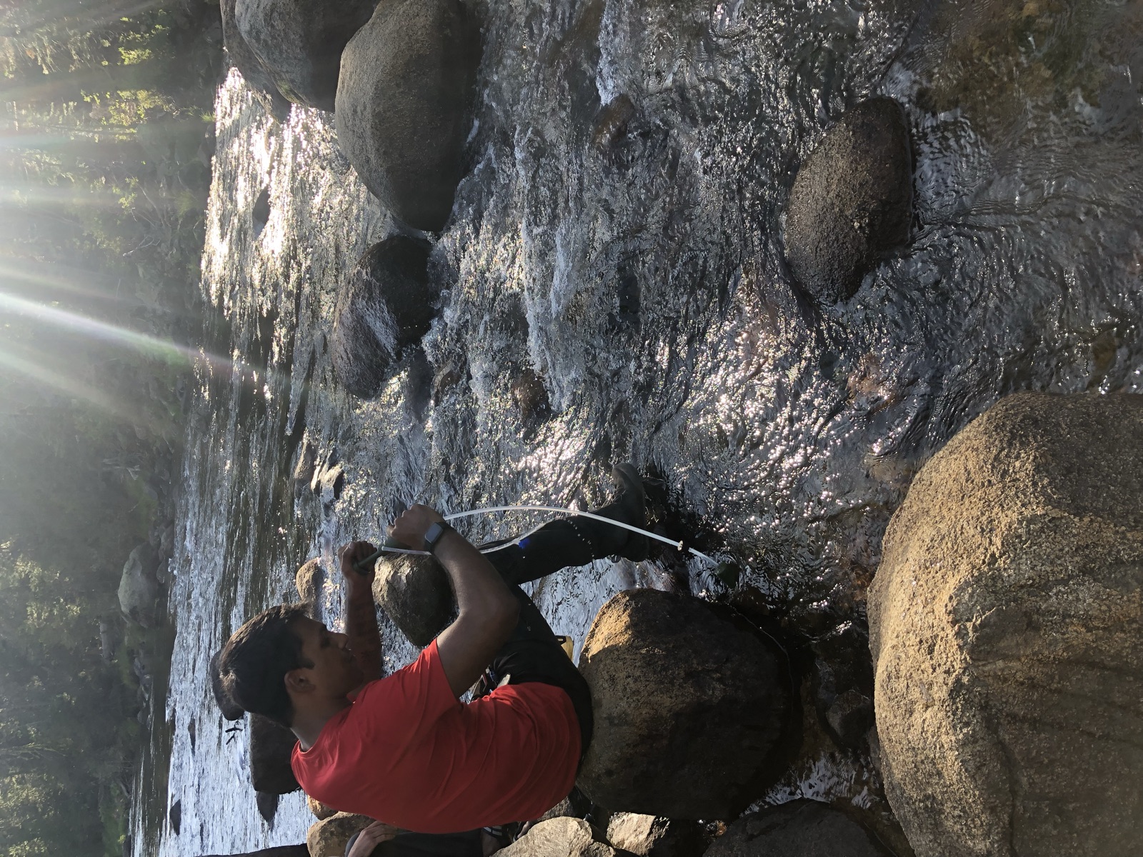 Using a water filter to refill from the river