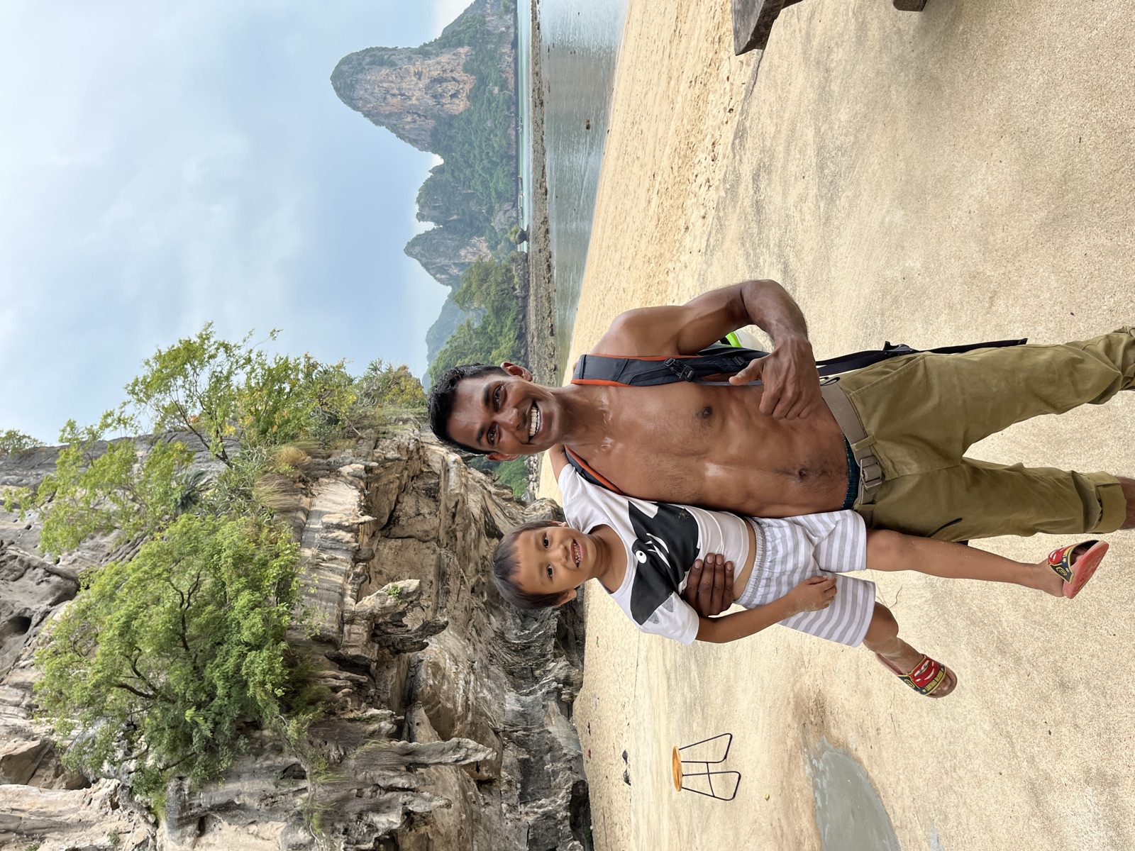 Fadeo giving a fist bump to a climber