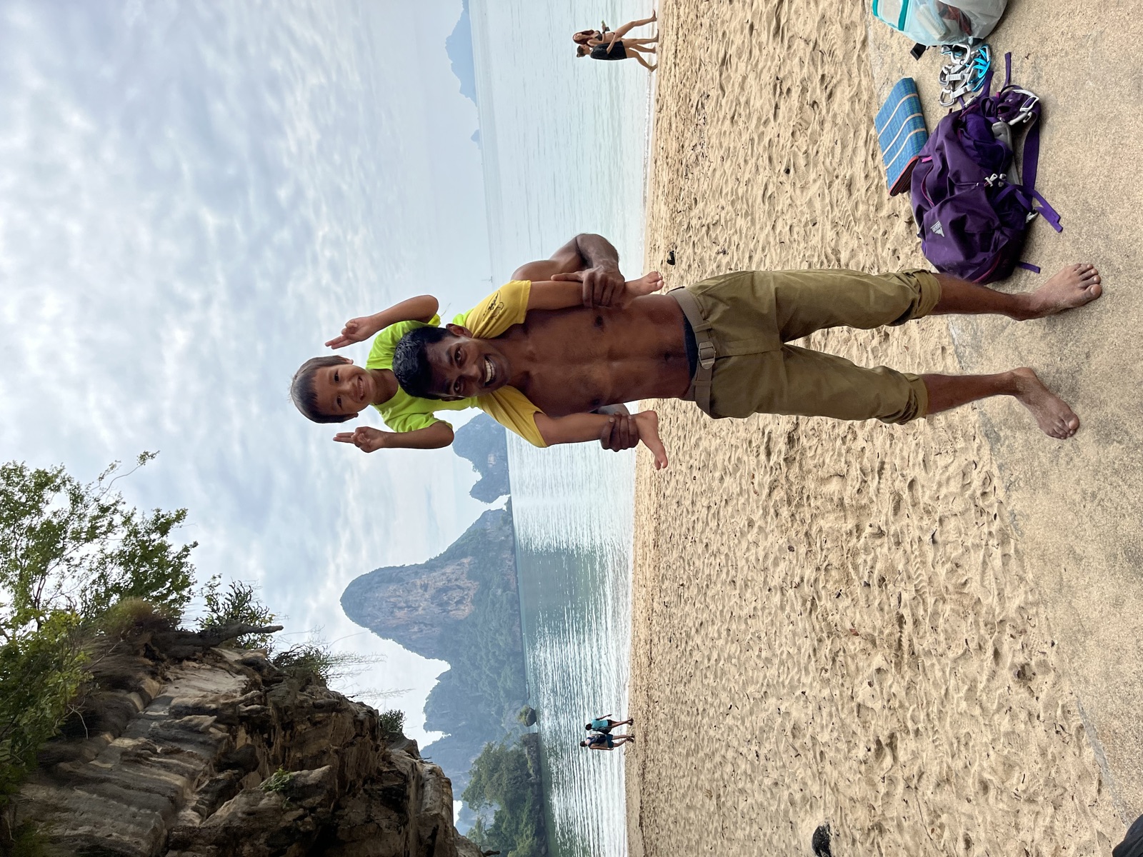 Fadeo giving a fist bump to a climber